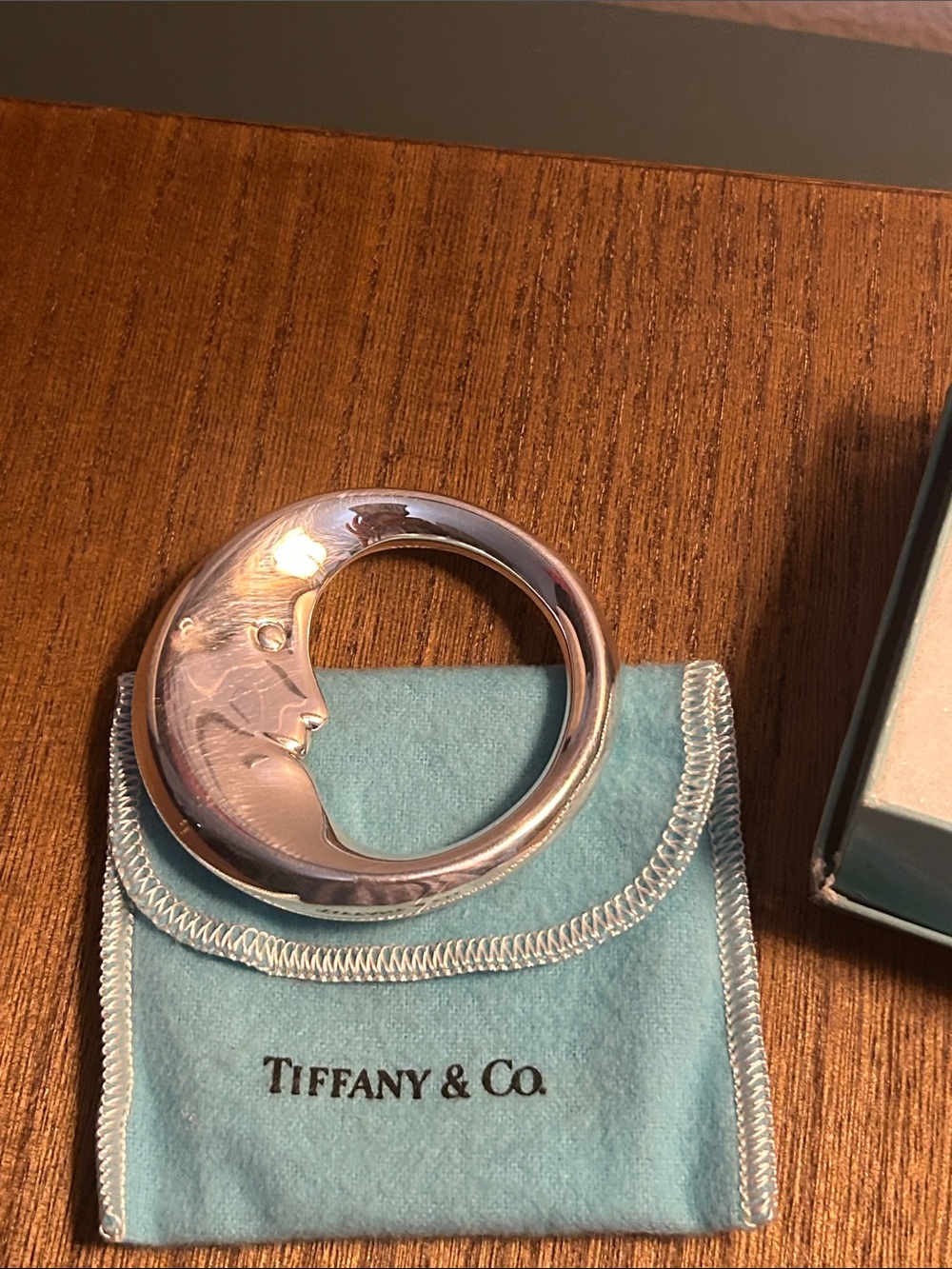 Tiffany & Co. Sterling Silver Moon-Shaped Baby rattle with Blue Pouch